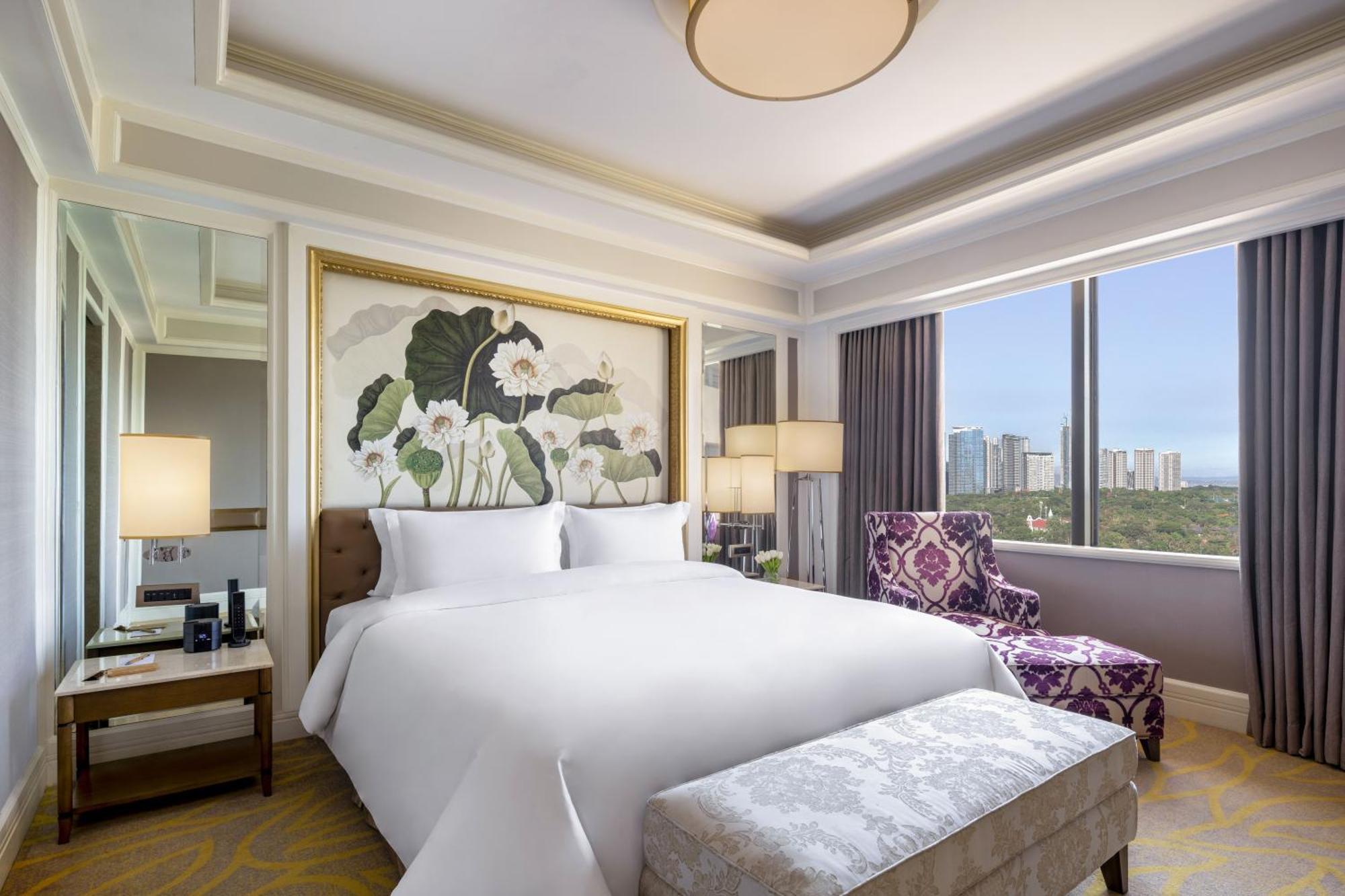 Dusit Thani Manila Makati City Pokoj fotografie A bedroom at the hotel